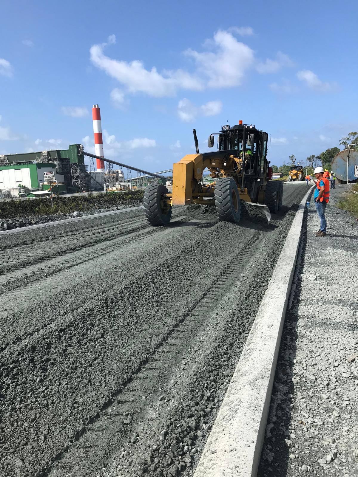 CAT motor grader making a final precision pass
