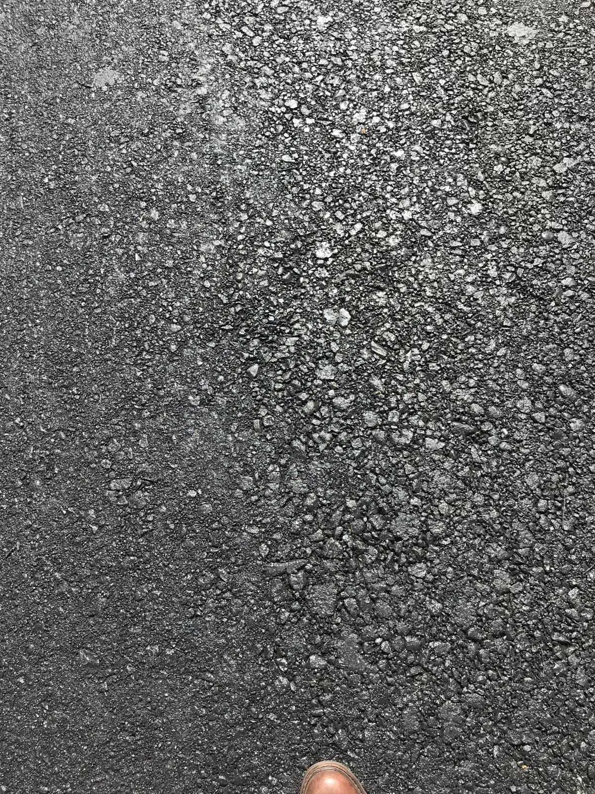 Residential road rehabilitated by cold in-place recycling